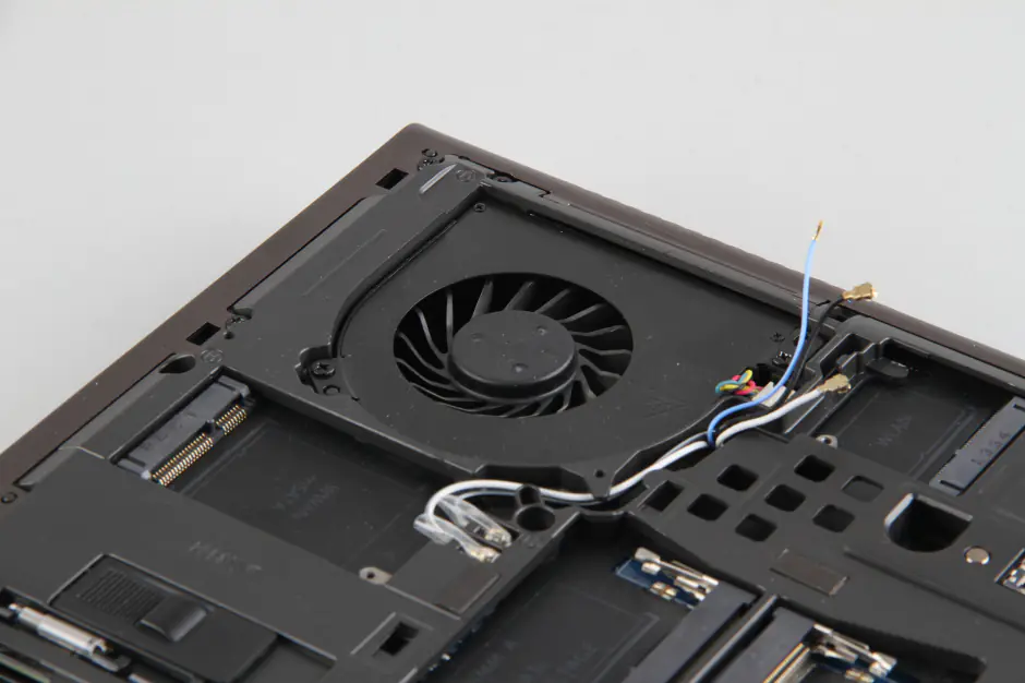 Remove two screws securing the right fan